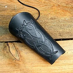 Embossed archery arm guard