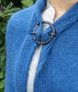 Forged ring brooch on model