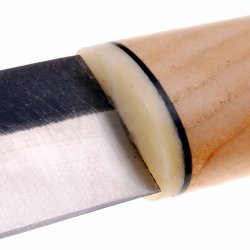 Bone slab in use on a knife