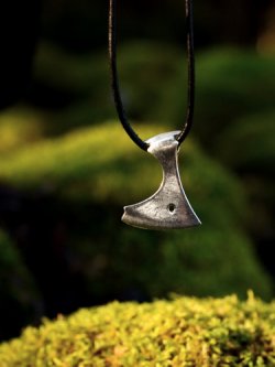 Viking axe charm in nature