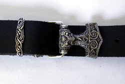 Buckle mounted to a belt