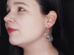 Vendel raven earrings in use