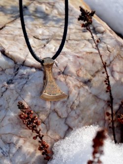 Viking axe amulet in nature