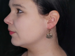 Viking ship earrings in use