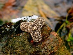 Viking treffoil brooch in nature