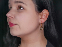 Spherical Viking earrings in use